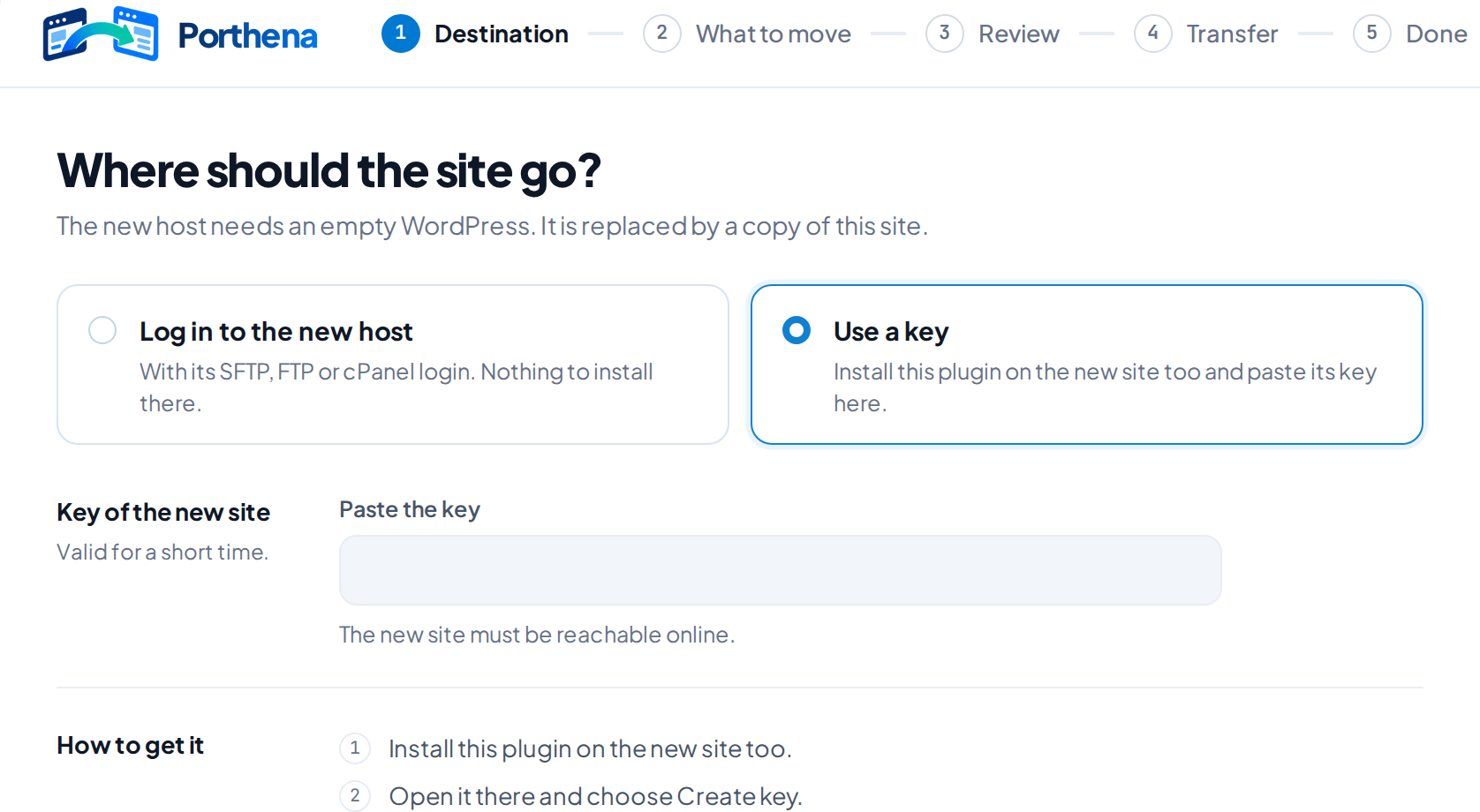 The Destination screen with Use a key chosen: a field to paste the key, three steps on how to get it, and the Create key button for the new site.